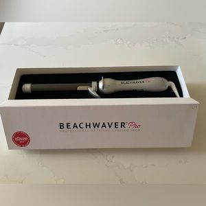 Beachwaver Pro professional rotating curling iron.  Almost new condition